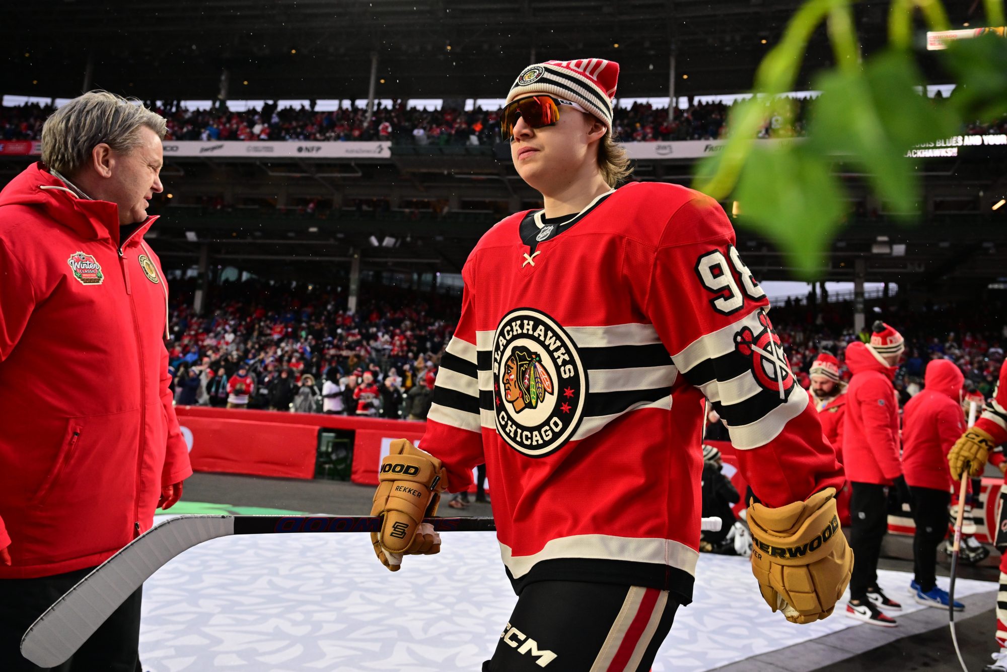 Dec 31, 2024; Chicago, Illinois, USA; Chicago Blackhawks center Connor Bedard (98) walks out to the rink before the Winter Classic against the St. Louis Blues at Wrigley Field