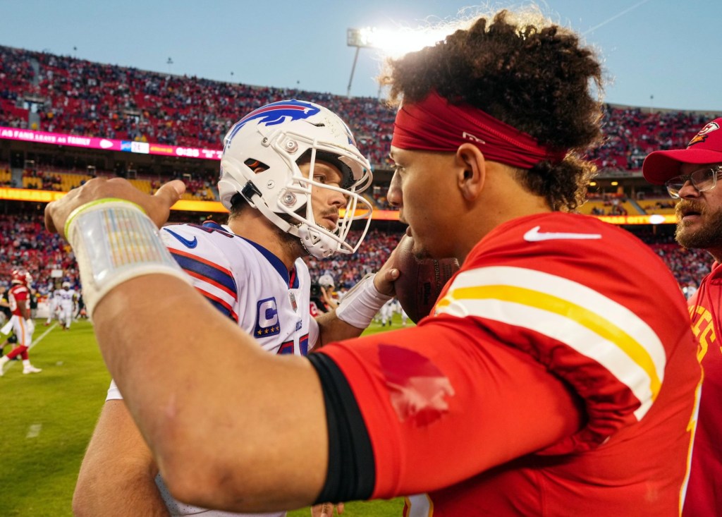 Oct 16, 2022; Kansas City, Missouri, USA; Buffalo Bills quarterback Josh Allen (17) hugs Kansas City Chiefs quarterback Patrick Mahomes (15) after a game at GEHA Field at Arrowhead Stadium.