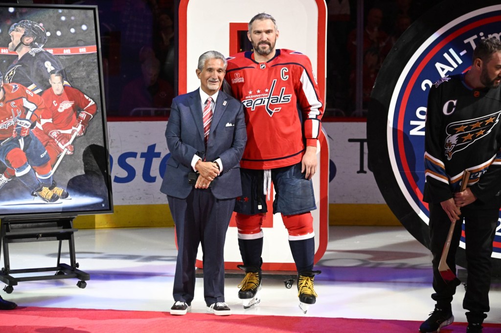 Mar 21, 2023; Washington, District of Columbia, USA; Washington Capitals left wing Alex Ovechkin (8) and owner Ted Leonsis during a ceremony to honor scoring an NHL second best 802 career goal before the game against the Columbus Blue Jackets at Capital One Arena. Mandatory Credit: