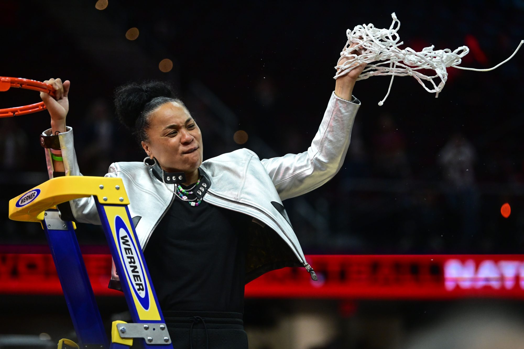 Apr 7, 2024; Cleveland, OH, USA; South Carolina Gamecocks head coach Dawn Staley cuts the net after defeating the Iowa Hawkeyes in the finals of the Final Four of the womens 2024 NCAA Tournament at Rocket Mortgage FieldHouse.