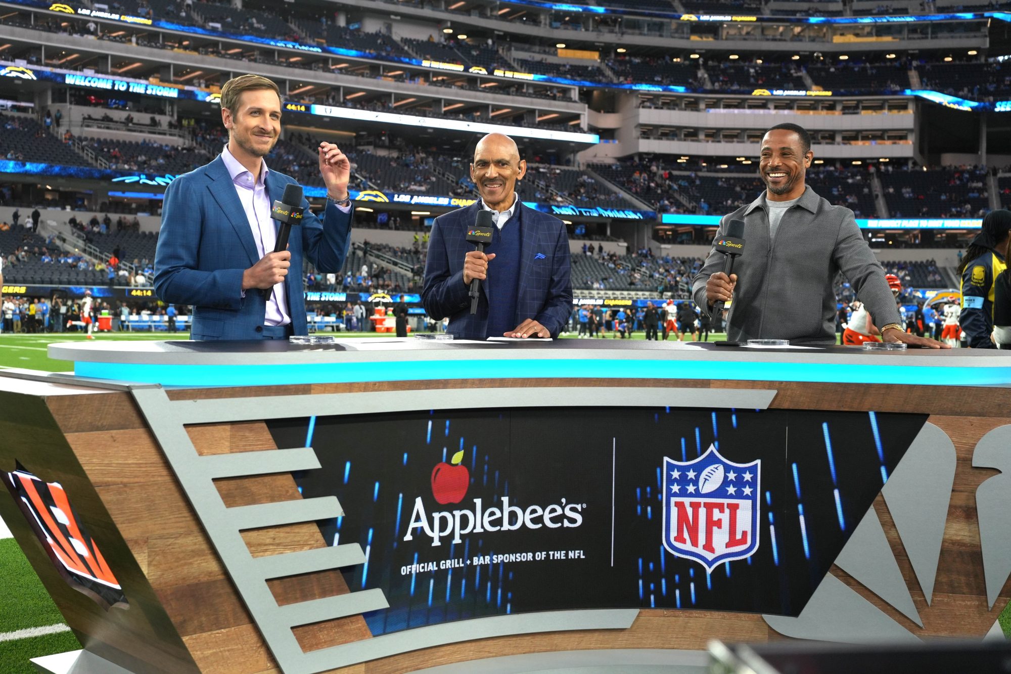 Nov 17, 2024; Inglewood, California, USA; Jac Collinsworth (left), Tony Dungy (center) and Rodney Harrison on the Sunday Night Football set at SoFi Stadium.