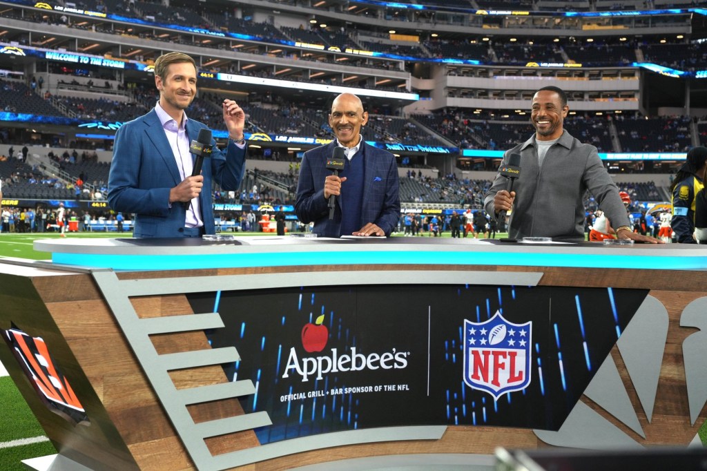 Nov 17, 2024; Inglewood, California, USA; Jac Collinsworth (left), Tony Dungy (center) and Rodney Harrison on the Sunday Night Football set at SoFi Stadium.