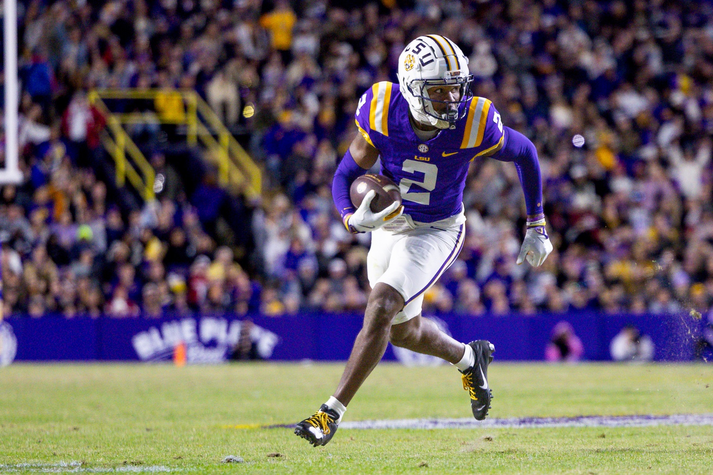 Nov 30, 2024; Baton Rouge, Louisiana, USA; LSU Tigers wide receiver Kyren Lacy (2) runs after a catch against the Oklahoma Sooners during the first quarter at Tiger Stadium.