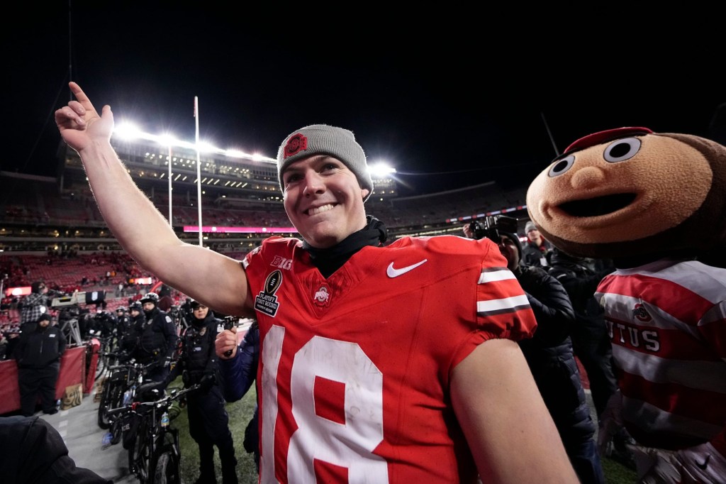 Ohio State Buckeyes quarterback Will Howard (18) leaves the field following the 42-17 win over the Tennessee Volunteers in the College Football Playoff first round game at Ohio Stadium in Columbus on Dec. 21, 2024. Ohio State will face Oregon in the Rose Bowl.