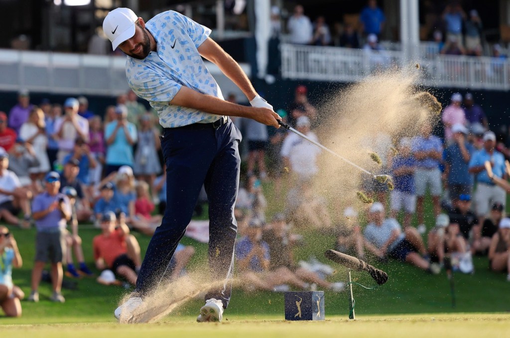 Scottie Scheffler tees off on hole 17 during the first round of The Players Championship PGA golf tournament Thursday, March 14, 2024 at TPC Sawgrass in Ponte Vedra Beach, Fla.