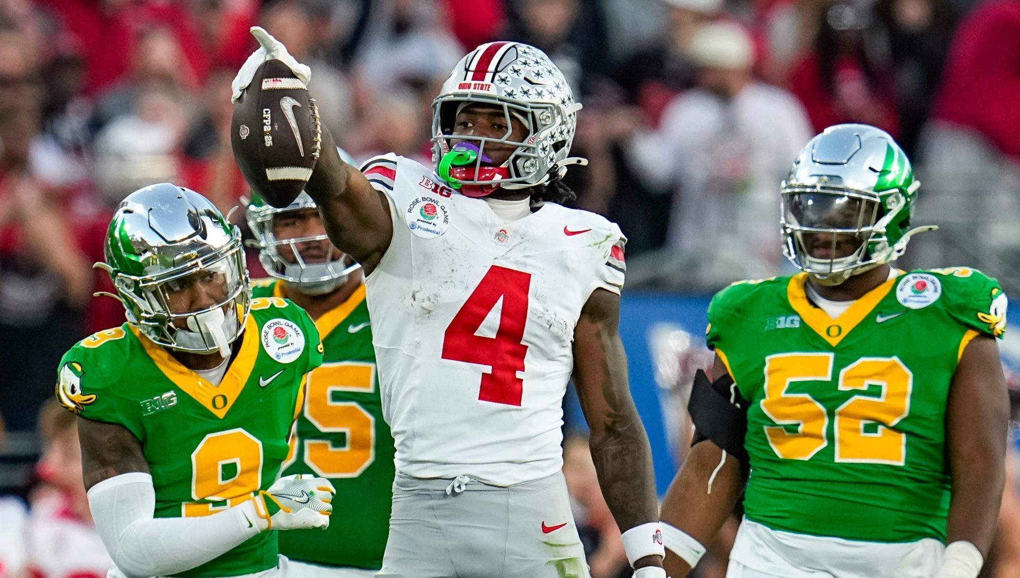 Ohio State wide receiver Jeremiah Smith (4) celebrates a first-down catch against Oregon during the 2025 Rose Bowl in Pasadena, Calif.