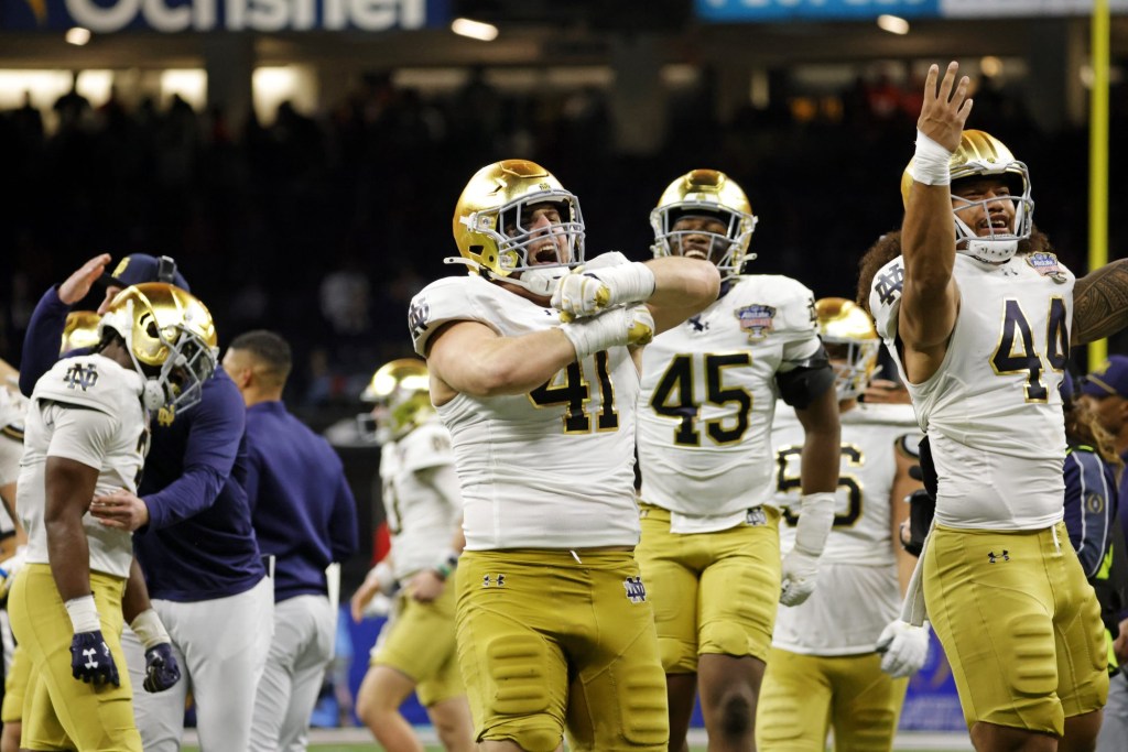 Jan 2, 2025; New Orleans, LA, USA; Notre Dame Fighting Irish defensive lineman Donovan Hinish (41) celebrates after a play against Georgia Bulldogs at Caesars Superdome.