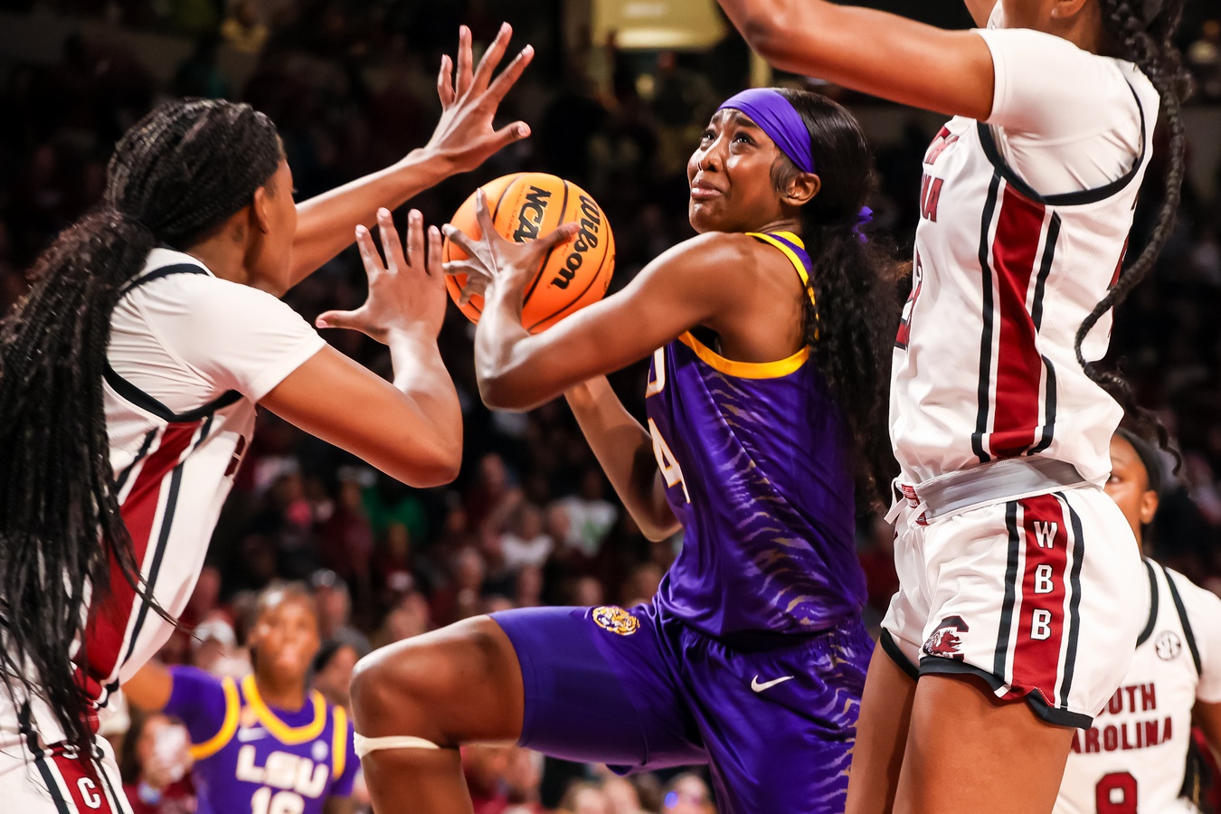 Jan 24, 2025; Columbia, South Carolina, USA; LSU Lady Tigers guard Flau'Jae Johnson (4) drives against the South Carolina Gamecocks in the second half at Colonial Life Arena.