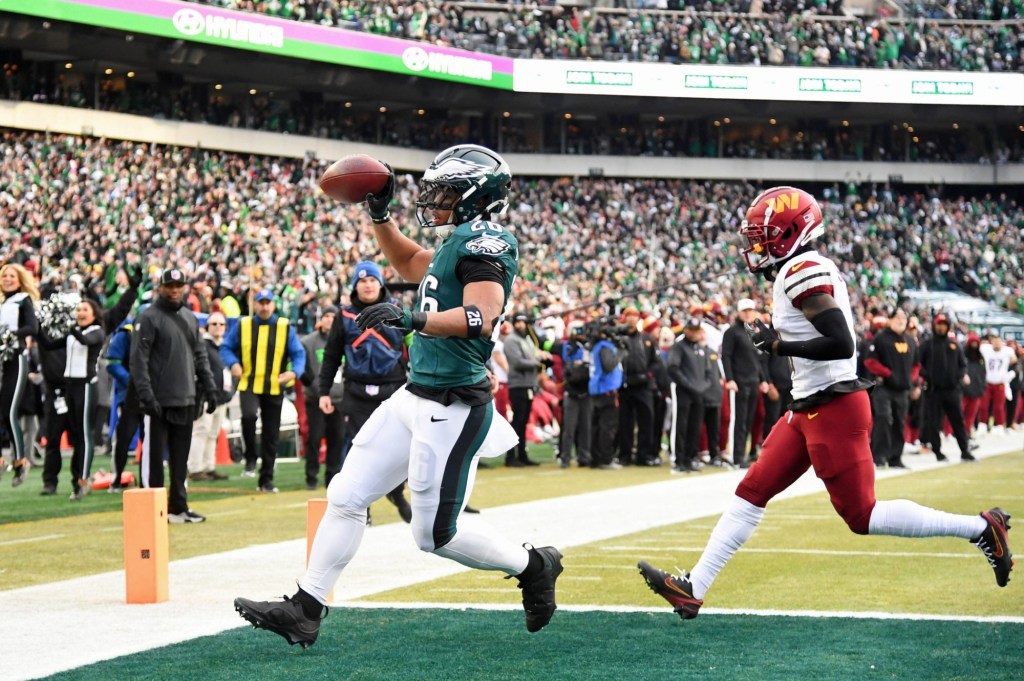 Jan 26, 2025; Philadelphia, PA, USA; Philadelphia Eagles running back Saquon Barkley (26) reacts after a touchdown against the Washington Commanders during the first half in the NFC Championship game at Lincoln Financial Field.