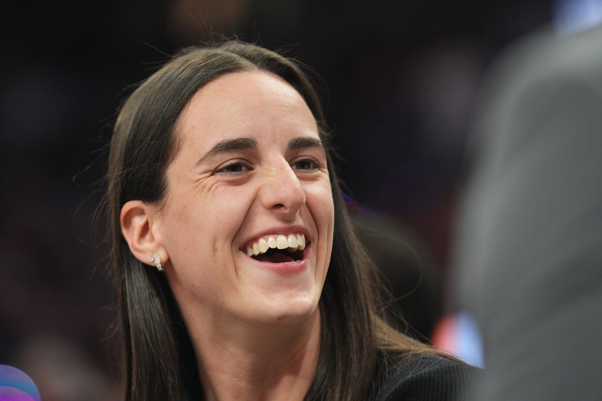 Nov 30, 2024; Phoenix, Arizona, USA; Indiana Fever player Caitlin Clark looks on during the second half of the game between the Phoenix Suns and the Golden State Warriors at Footprint Center
