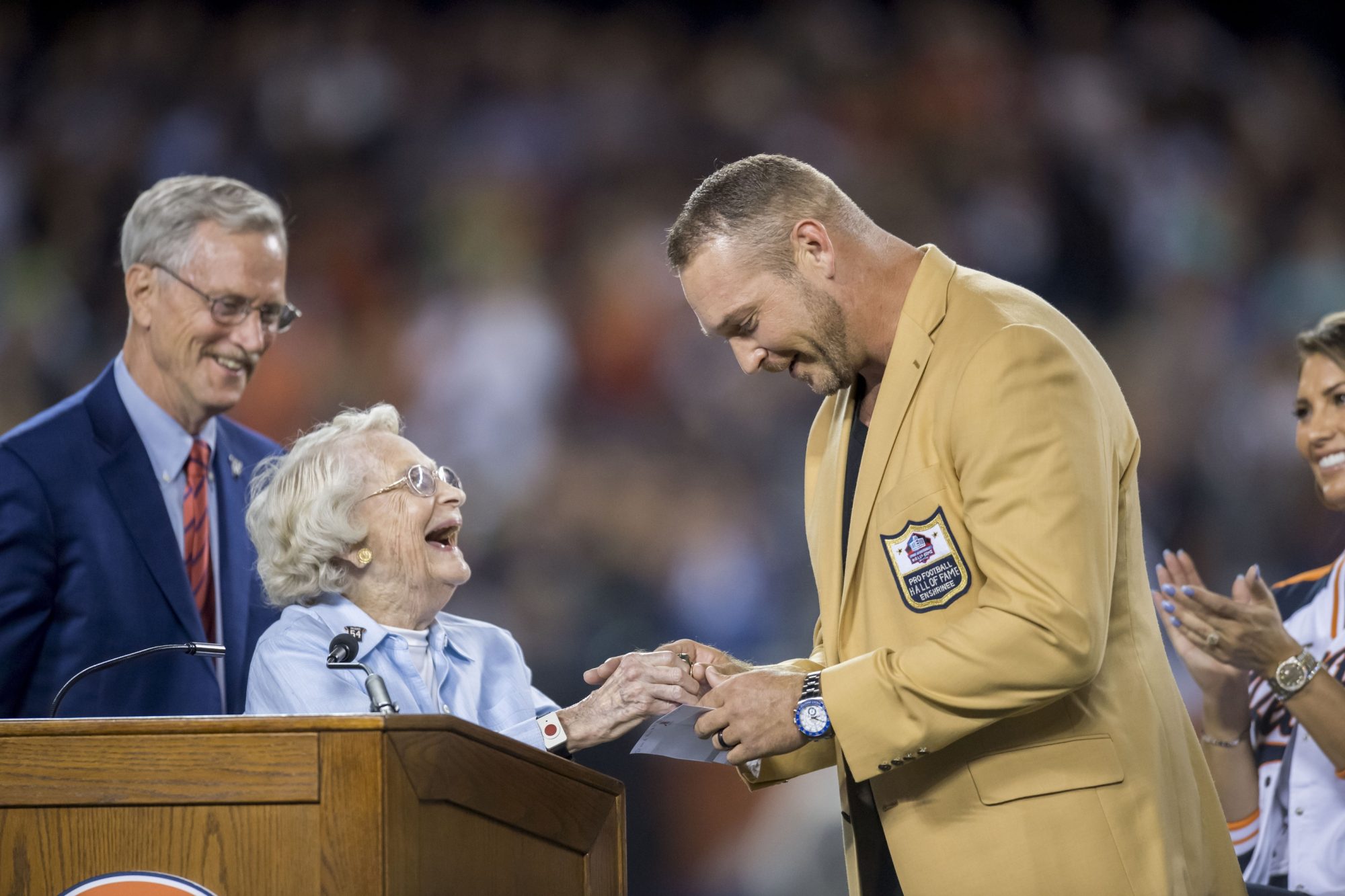 Sep 17, 2018; Chicago, IL, USA; Chicago Bears former player Brian Urlacher is honored with a Ring of Excellence from Chicago Bears owner Virginia Halas McCaskey during half time of a game between the Chicago Bears and the Seattle Seahawks at Soldier Field.