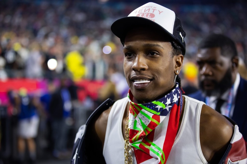 Feb 12, 2023; Glendale, Arizona, US; A$AP Rocky on the sideline after halftime during Super Bowl LVII at State Farm Stadium.