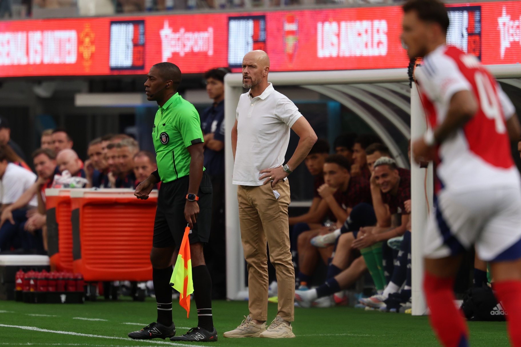 Jul 27, 2024; Inglewood, CA, USA; Manchester United head coach Erik ten Hag watches a game against the Arsenal from the sideline during the first half at SoFi Stadium.