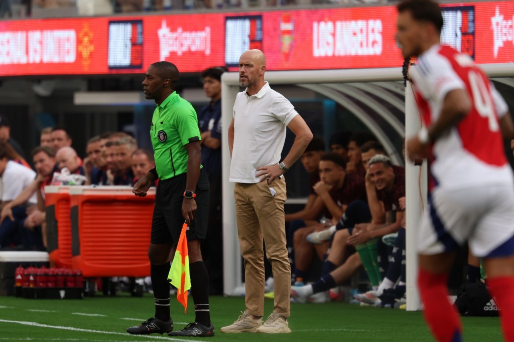 Jul 27, 2024; Inglewood, CA, USA; Manchester United head coach Erik ten Hag watches a game against the Arsenal from the sideline during the first half at SoFi Stadium.