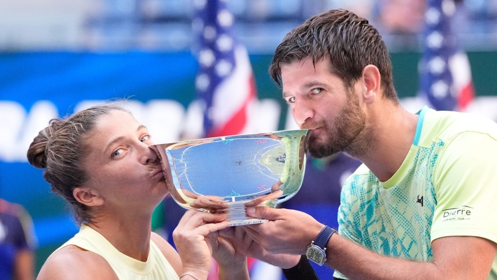 Sept 5 2024; Flushing, NY, USA; Sara Errani and Andrea Vavassori (ITA) with the US Open trophy after beating Donald Young and Taylor Townsend (USA) in the Mixed Doubles Final on day eleven of the 2024 U.S. Open tennis tournament at USTA Billie Jean King National Tennis Center.