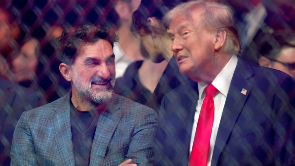 Nov 16, 2024; New York, NY, USA; Saudi businessman Yasir Al-Rumayyan (left) talks to president-elect Donald Trump during UFC 309 at Madison Square Garden.