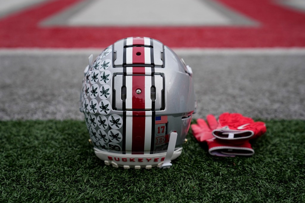 An Ohio State Buckeyes helmet sits on the sideline prior to the NCAA football game against the Indiana Hoosiers at Ohio Stadium in Columbus on Saturday, Nov. 23, 2024.