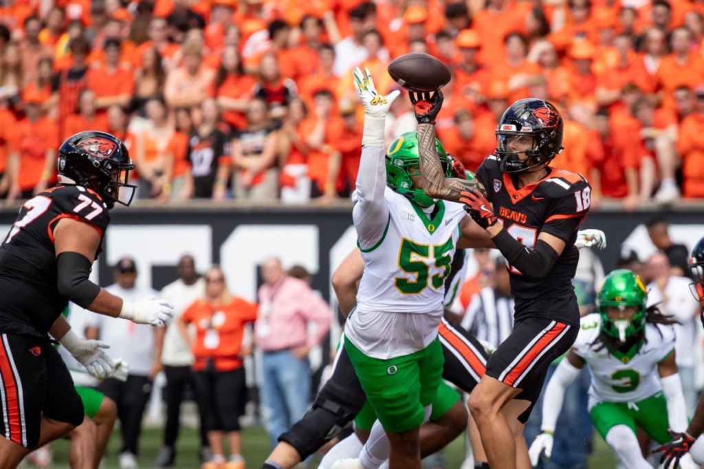 Oregon defensive lineman Derrick Harmon pressures Oregon State wide receiver Jeremiah Noga as the Oregon State Beavers host the Oregon Ducks Saturday, Sept. 14, 2024 at Reser Stadium in Corvallis, Ore.