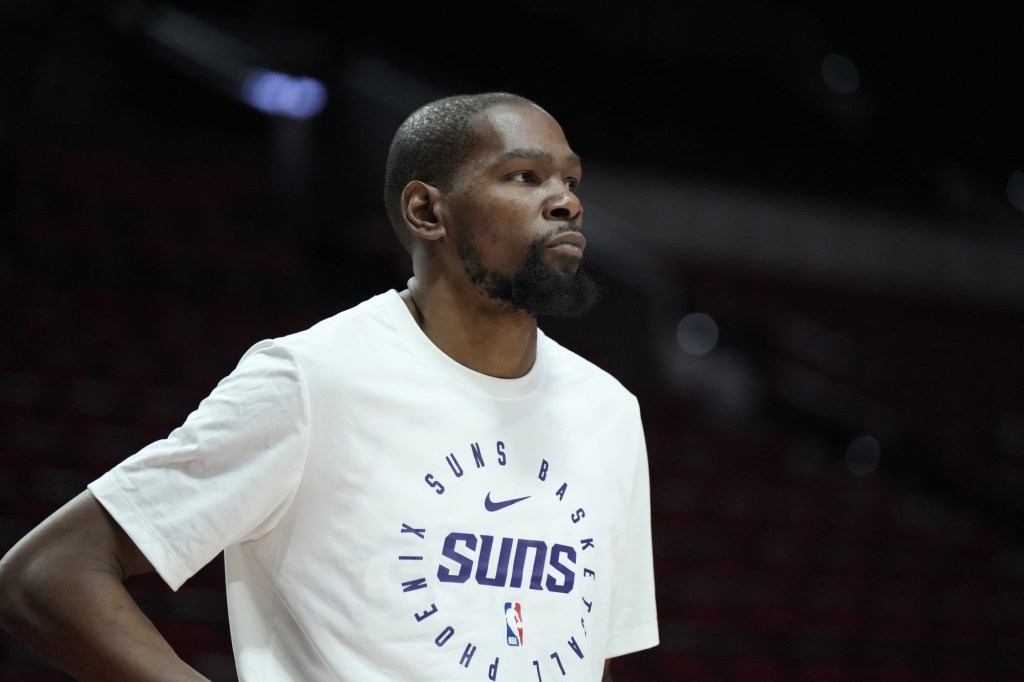 Feb 1, 2025; Portland, Oregon, USA; Phoenix Suns power forward Kevin Durant (35) looks on during warm ups before the game against the Portland Trail Blazers at Moda Center.