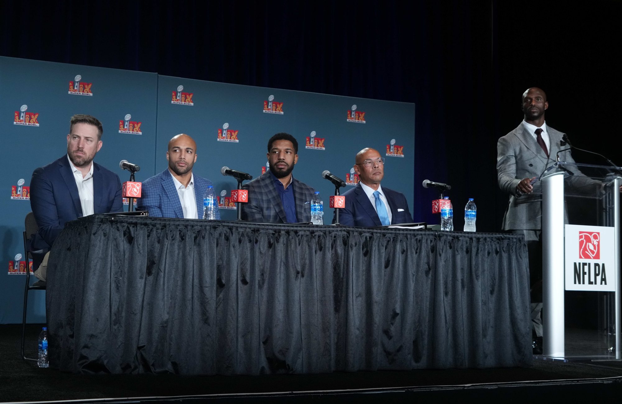 Feb 5, 2025; New Orleans, LA, USA; From left Case Keenum, Austin Ekeler, Jalen Reeves-Maybin, Lloyd Howell and Jason McCourty during the NFLPA press conference in advance of Super Bowl LIX at the New Orleans Convention Center.