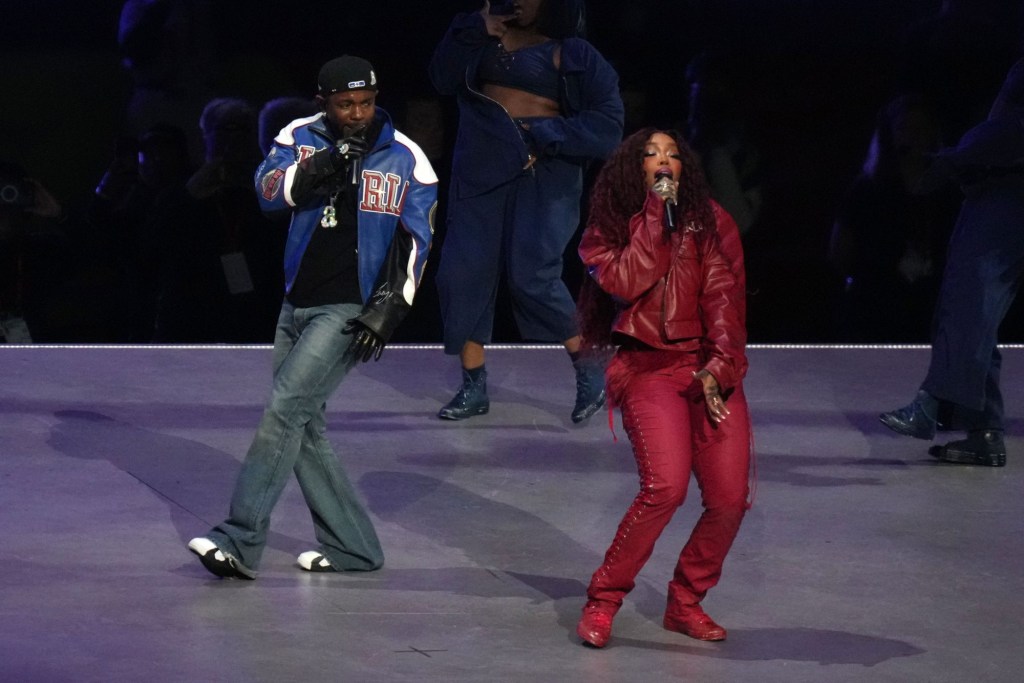 Feb 9, 2025; New Orleans, LA, USA; Recording artist SZA and recording artist Kendrick Lamar perform during halftime Super Bowl LIX at Caesars Superdome.