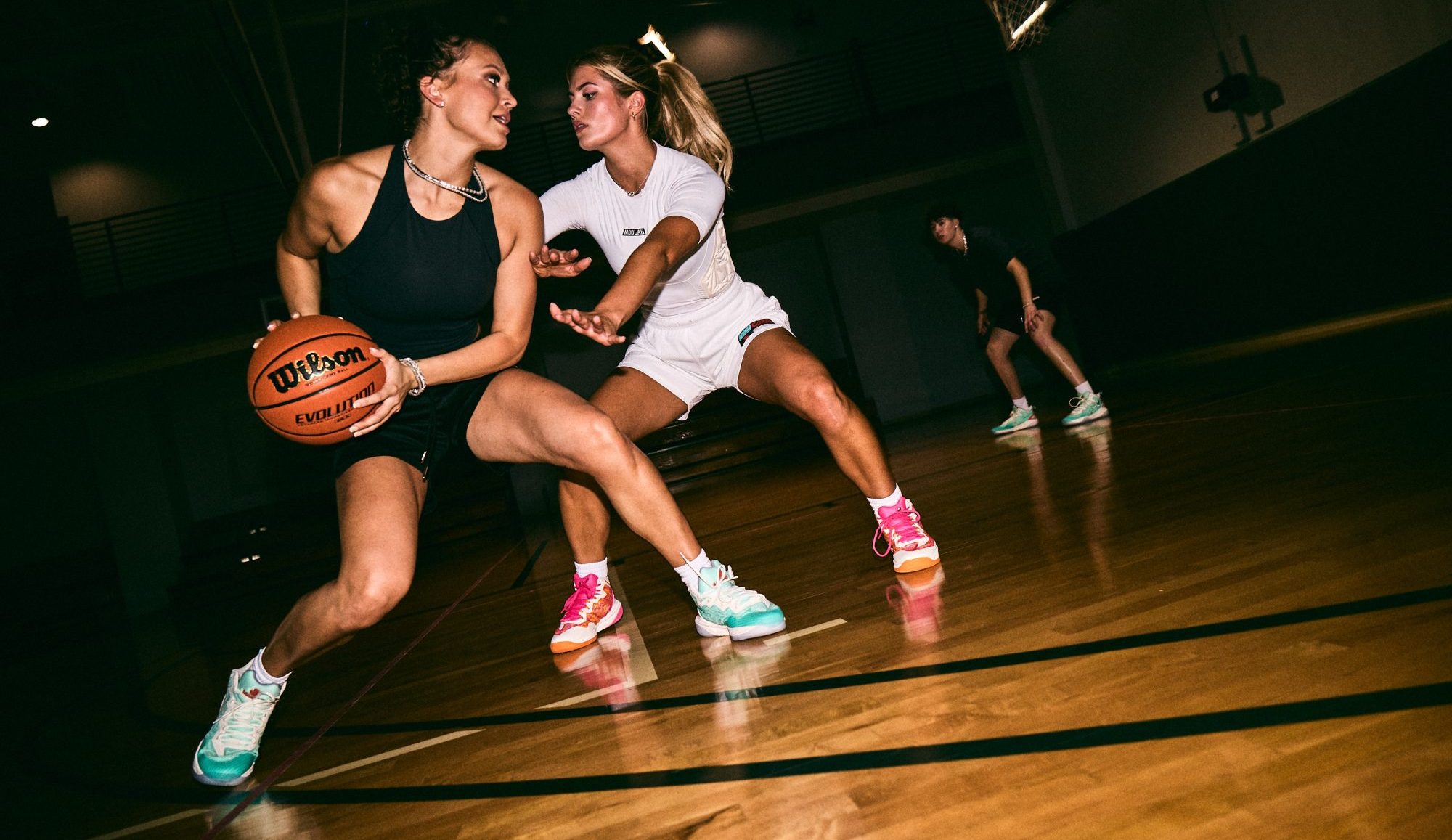 women wearing basketball shoes