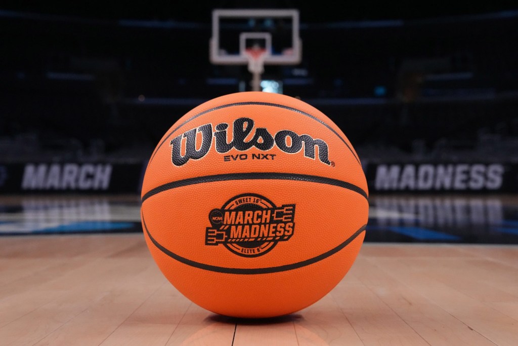 Mar 27, 2024; Los Angeles, CA, USA; A Wilson official Evo NXT game basketball with March Madness and Elite 8 and Sweet 16 logo at Crypto.com Arena.