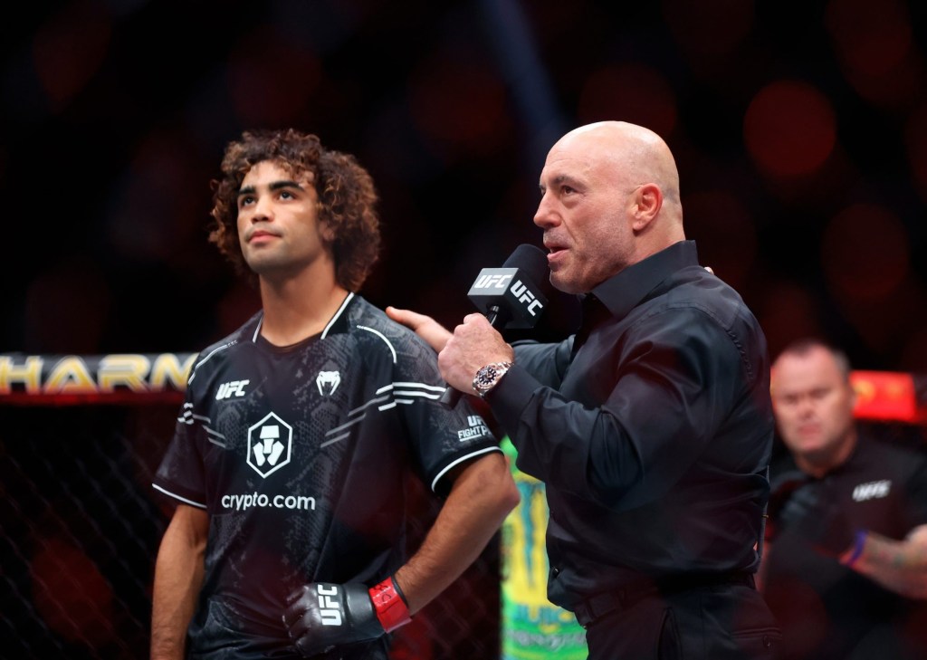 Jun 29, 2024; Las Vegas, Nevada, USA; Payton Talbott (left) is interviewed by Joe Rogan during UFC 303 at T-Mobile Arena.