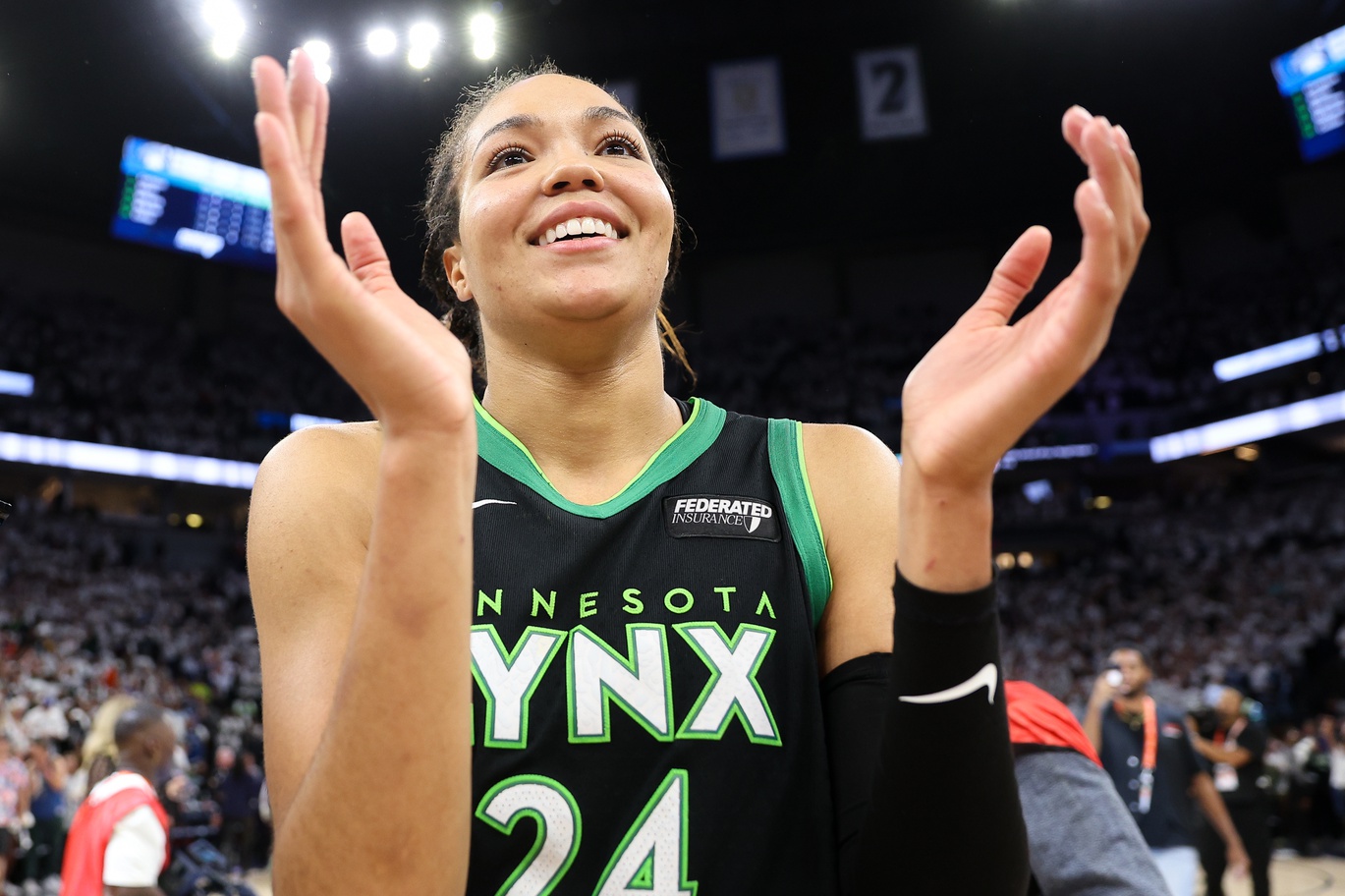 Oct 18, 2024; Minneapolis, Minnesota, USA; Minnesota Lynx forward Napheesa Collier (24) celebrates her teams win after game four of the 2024 WNBA Finals against the New York Liberty at Target Center.