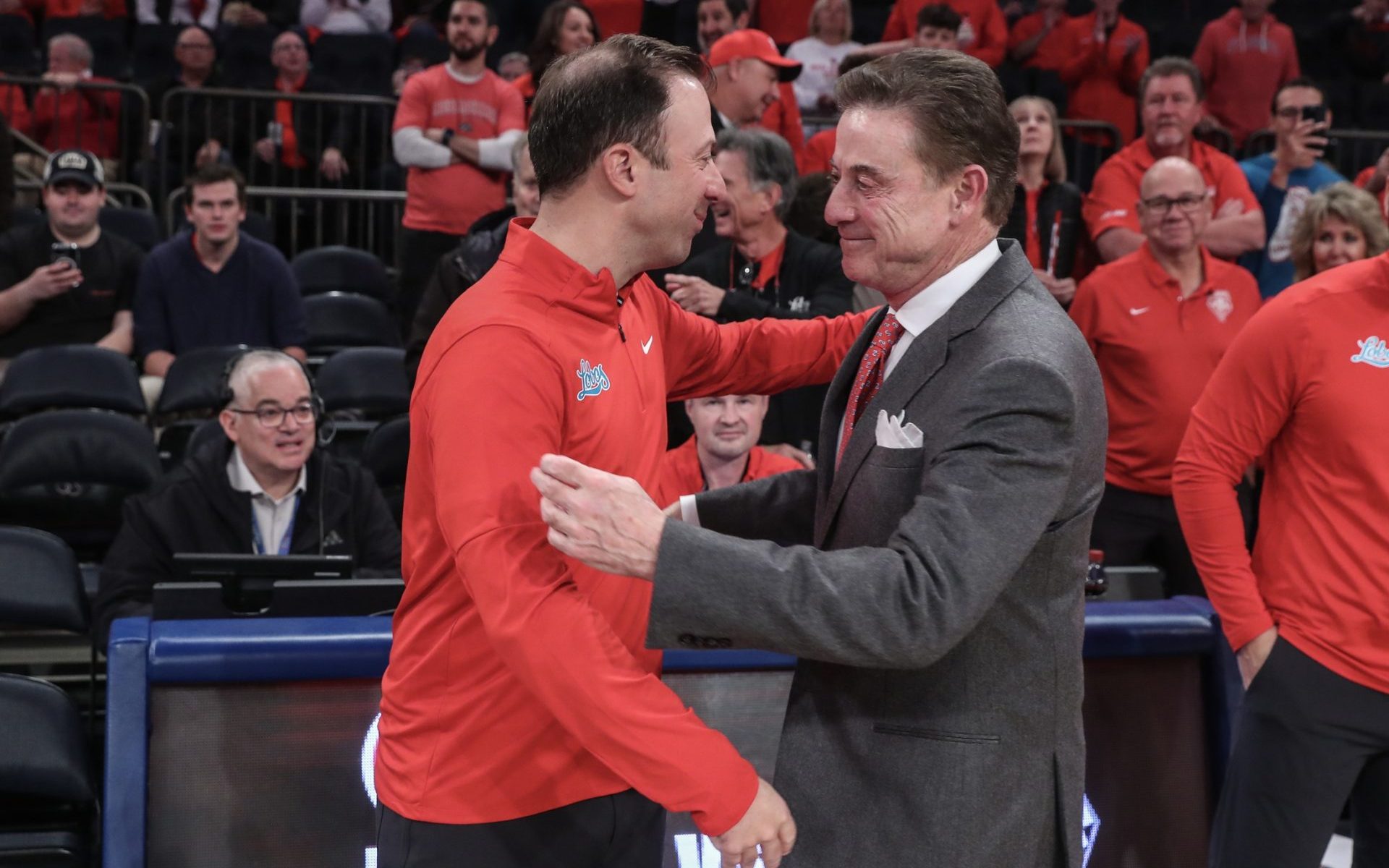Nov 17, 2024; New York, New York, USA; New Mexico Lobos head coach Richard Pitino and St. John's Red Storm head coach Rick Pitino greet each other prior to the start of the game at Madison Square Garden.
