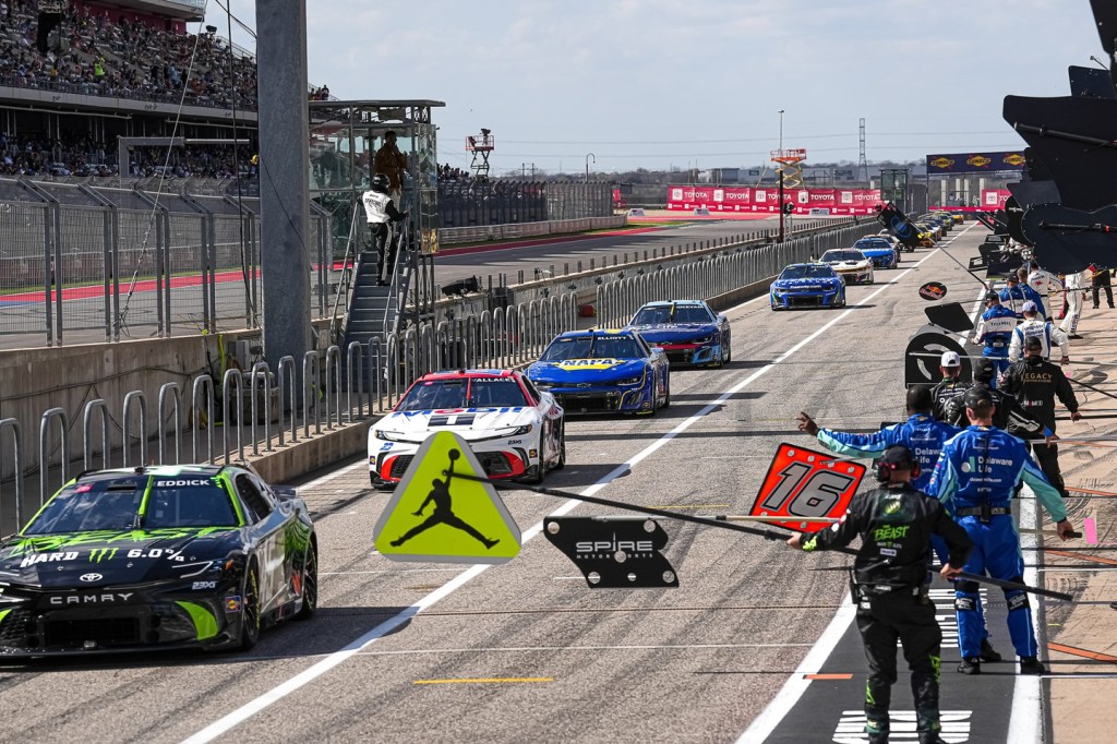 Drivers parade through pit lane at the start of the NASCAR Cup Series EchoPark Automotive Grand Prix at Circuit of the Americas on Sunday, March 2, 2025 in Austin.