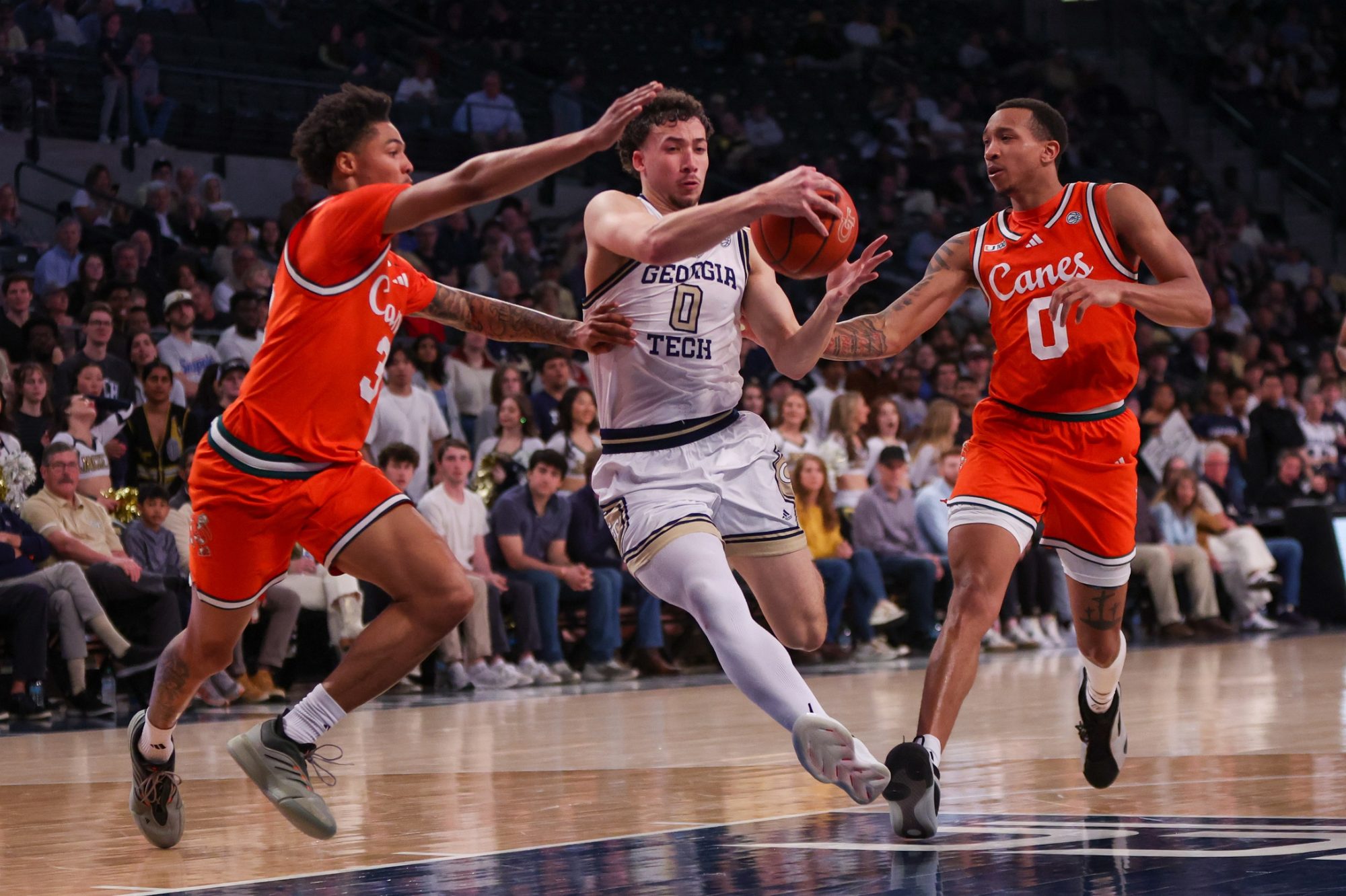 Mar 4, 2025; Atlanta, Georgia, USA; Georgia Tech Yellow Jackets guard Lance Terry (0) drives to the basket against the Miami Hurricanes in the second half at McCamish Pavilion.