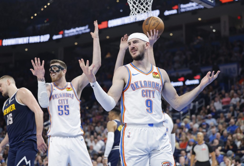 Mar 10, 2025; Oklahoma City, Oklahoma, USA; Oklahoma City Thunder guard Alex Caruso (9) and center Isaiah Hartenstein (55) react after a call on a play against the Denver Nuggets during the second quarter at Paycom Center.