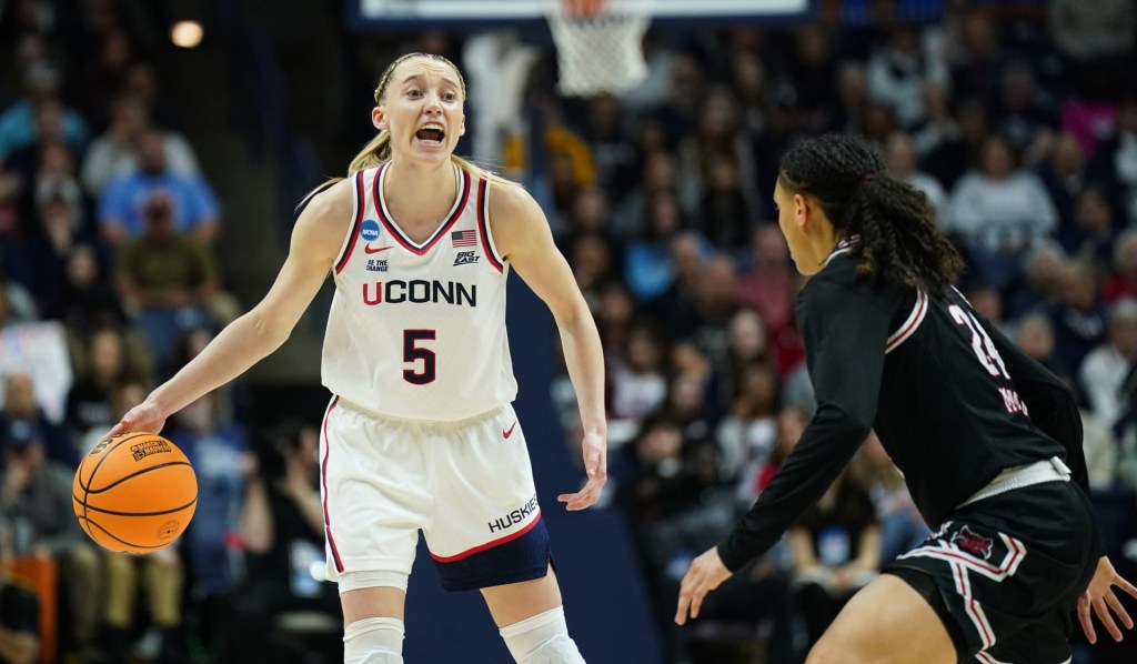 Mar 22, 2025; Storrs, Connecticut, USA; UConn Huskies guard Paige Bueckers (5) looks for an opening against the Arkansas State Red Wolves in the first half at Harry A. Gampel Pavilion.