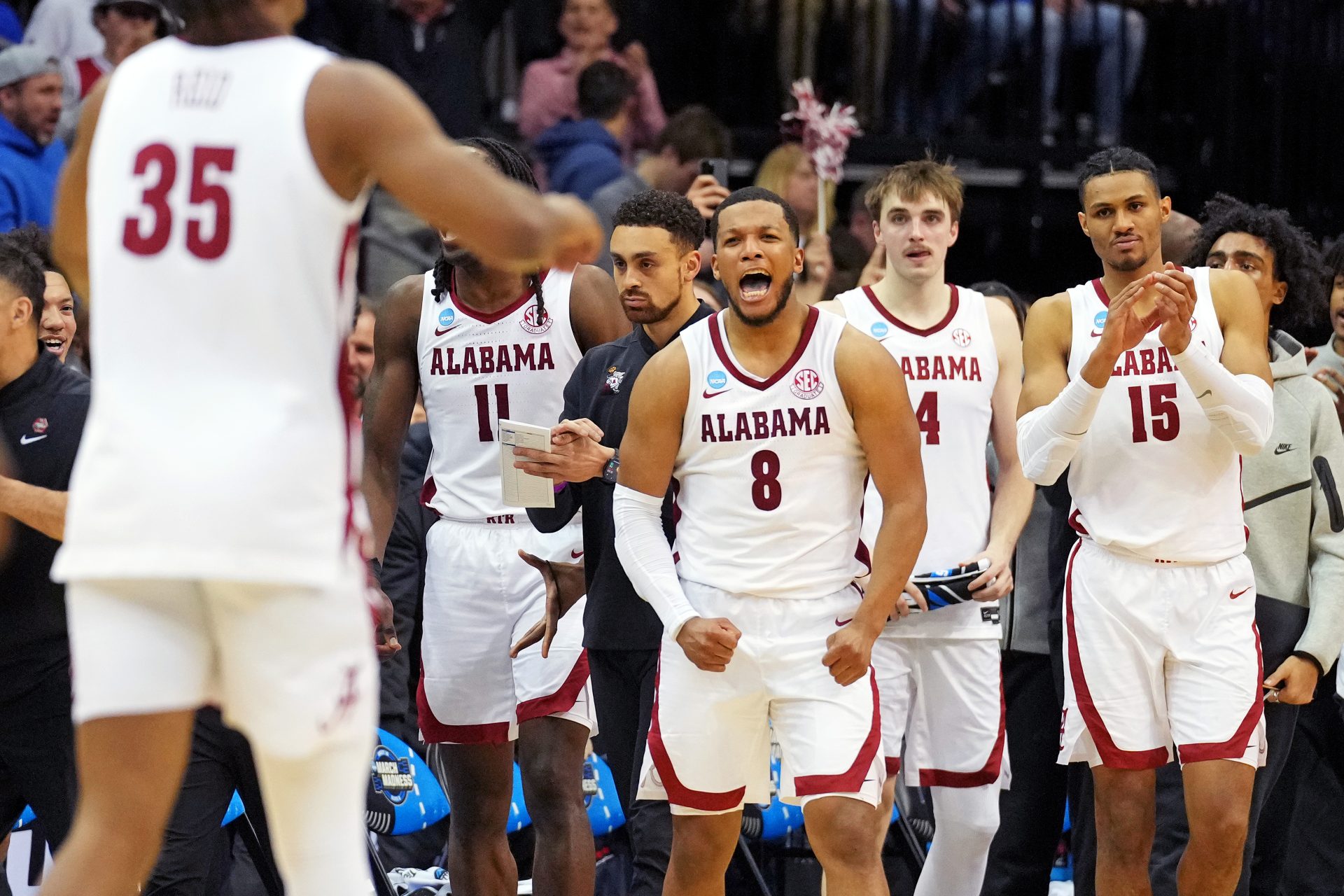 Mar 27, 2025; Newark, NJ, USA; Alabama Crimson Tide guard Chris Youngblood (8) and the Alabama Crimson Tide bench celebrate during the second half against the Brigham Young Cougars during an East Regional semifinal of the 2025 NCAA tournament at Prudential Center.