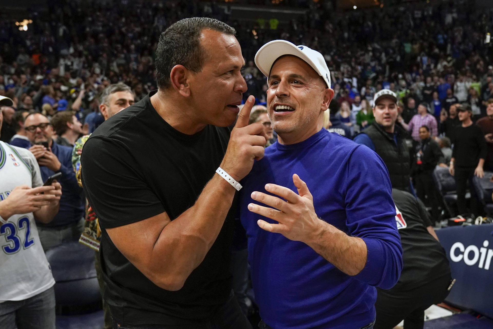 Apr 12, 2022; Minneapolis, Minnesota, USA; Minnesota Timberwolves co-minority owners Alex Rodriguez and Marc Lore celebrate a victory over the Los Angeles Clippers after a play-in game at Target Center.