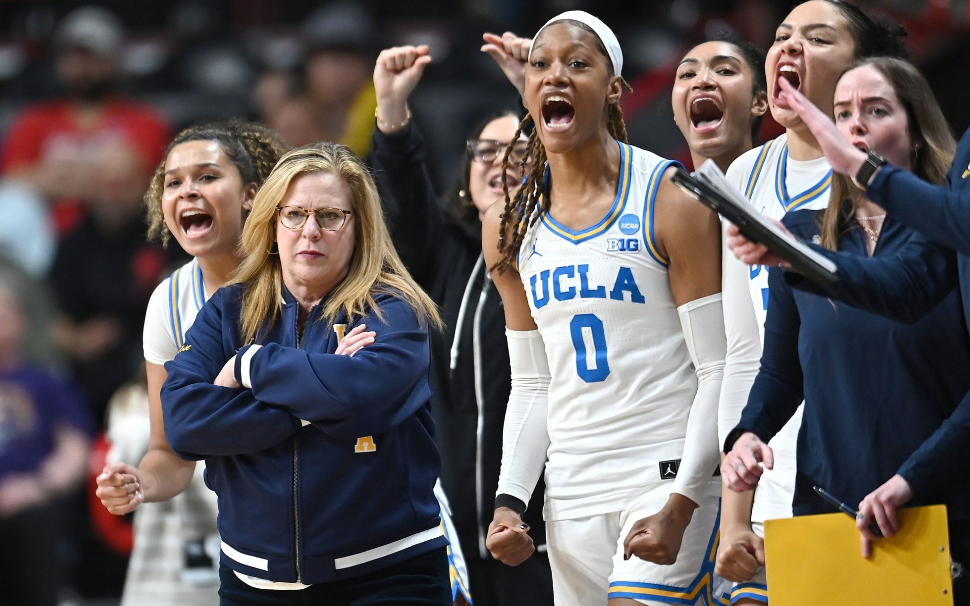 Mar 30, 2025; Spokane, WA, USA; UCLA Bruins head coach Cori Close looks on against the LSU Lady Tigers during the first half of a Elite 8 NCAA Tournament basketball game at Spokane Arena.