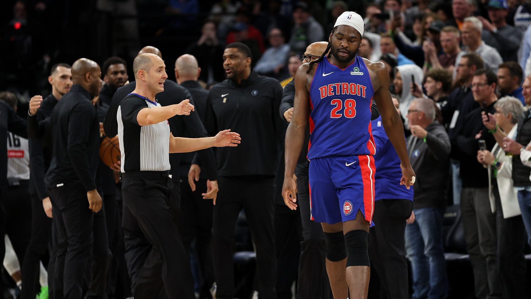 Mar 30, 2025; Minneapolis, Minnesota, USA; Detroit Pistons center Isaiah Stewart (28) reacts after a fight against the Minnesota Timberwolves during the second quarter at Target Center. Stewart was later ejected from the game.