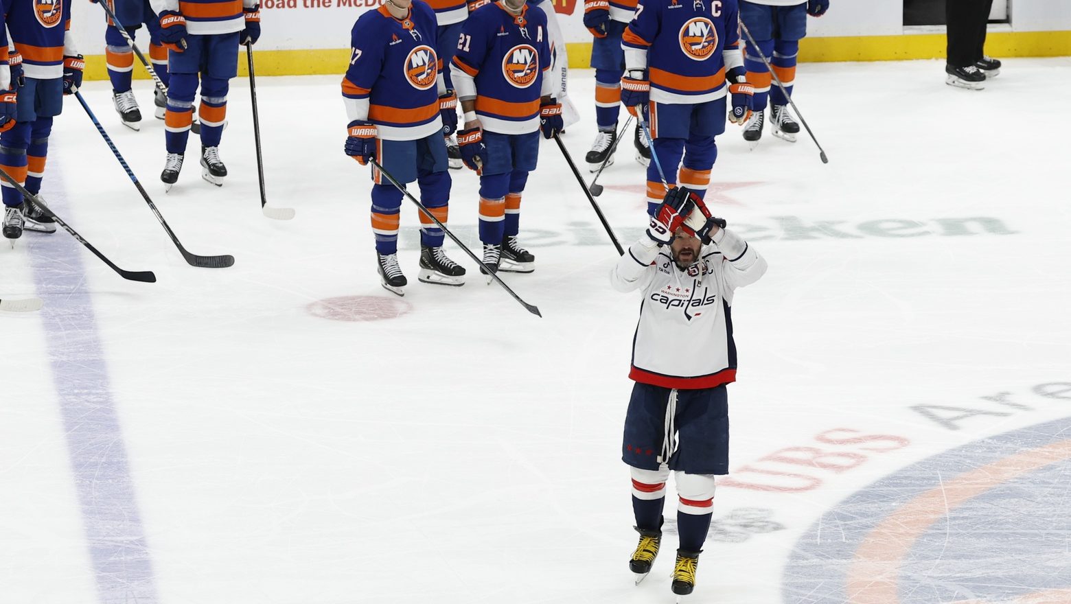 Apr 6, 2025; Elmont, New York, USA; Washington Capitals left wing Alex Ovechkin (8) celebrates after scoring in the during the second period against the New York Islanders at UBS Arena. Ovechkin scored the 895th goal of his career, breaking the NHL all-time career goals record previously held by Wayne Gretzky at UBS Arena