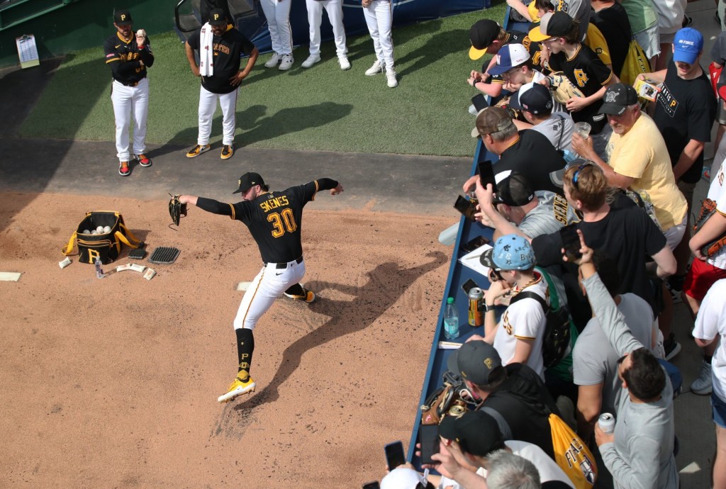 Apr 19, 2025; Pittsburgh, Pennsylvania, USA; Fans look on as Pittsburgh Pirates starting pitcher Paul Skenes (30) warms up in the bullpen before pitching against the Cleveland Guardians at PNC Park. Mandatory Credit: