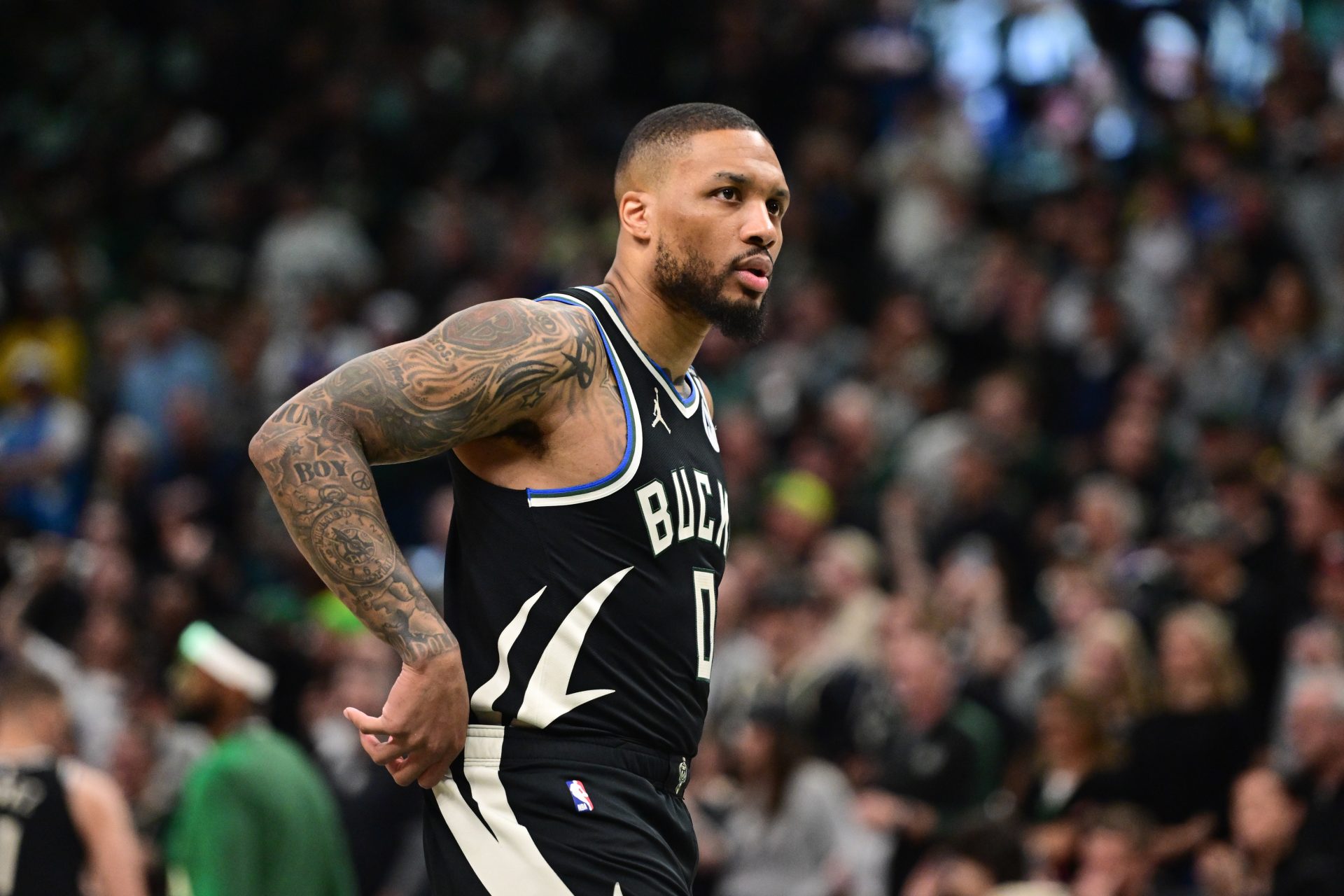 Apr 27, 2025; Milwaukee, Wisconsin, USA; Milwaukee Bucks guard Damian Lillard (0) looks on in the first quarter during game four against the Indiana Pacers of first round for the 2024 NBA Playoffs at Fiserv Forum. Lillard left the game early in the in the first quarter with an injury.