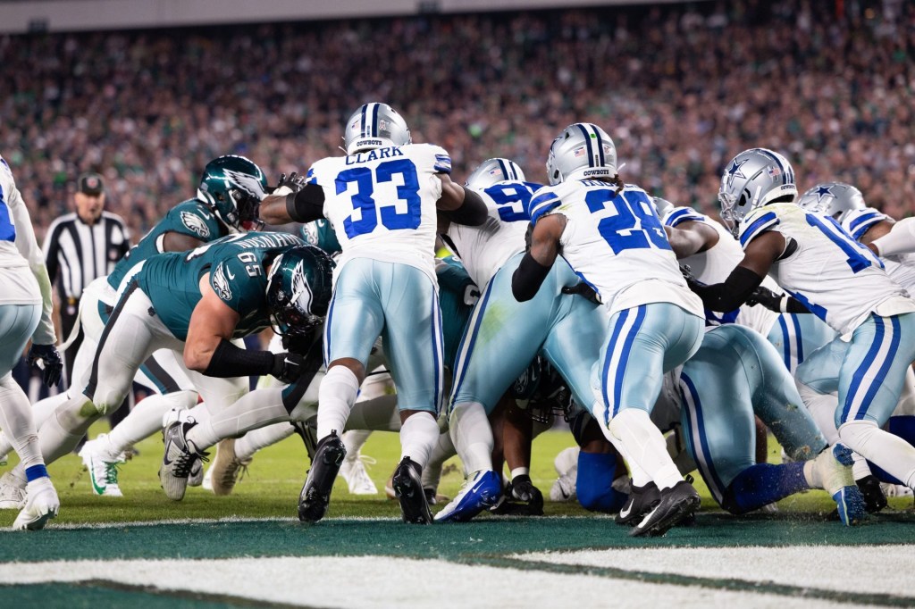 Nov 5, 2023; Philadelphia, Pennsylvania, USA; Philadelphia Eagles quarterback Jalen Hurts (1) scores a touchdown on a quarterback sneak against the Dallas Cowboys during the second quarter at Lincoln Financial Field.