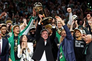 Jun 17, 2024; Boston, Massachusetts, USA; Boston Celtics owner Wyc Grousbeck celebrates with the Larry O’Brien Trophy after the Boston Celtics beat the Dallas Mavericks in game five of the 2024 NBA Finals at TD Garden.