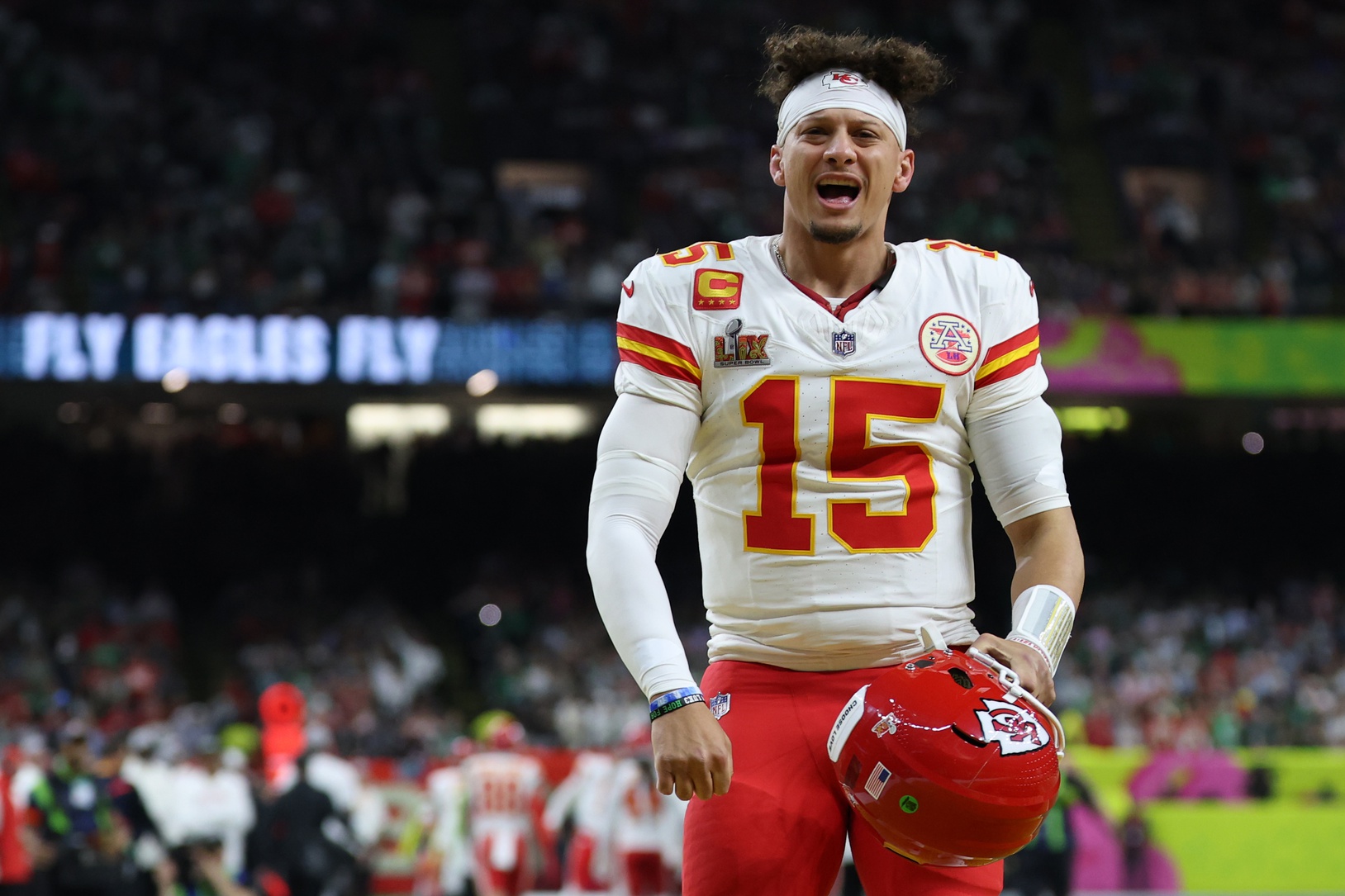 Feb 9, 2025; New Orleans, LA, USA; Kansas City Chiefs quarterback Patrick Mahomes (15) reacts on the field after the coin toss prior to the Chiefs' game against the Philadelphia Eagles in Super Bowl LIX at Caesars Superdome.