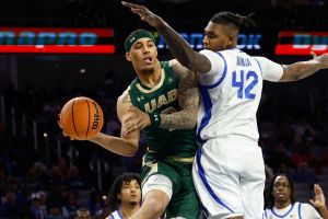 Mar 16, 2025; Fort Worth, TX, USA; UAB Blazers forward Yaxel Lendeborg (3) looks to pass as Memphis Tigers forward Dain Dainja (42) defends during the first half at Dickies Arena.