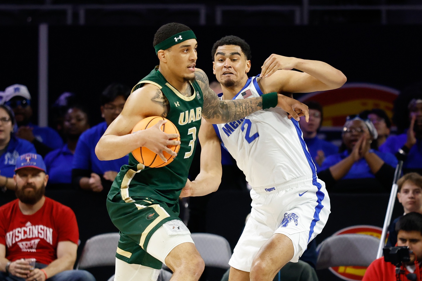 Mar 16, 2025; Fort Worth, TX, USA; UAB Blazers forward Yaxel Lendeborg (3) drives to the basket as Memphis Tigers forward Nicholas Jourdain (2) defends during the first half at Dickies Arena.