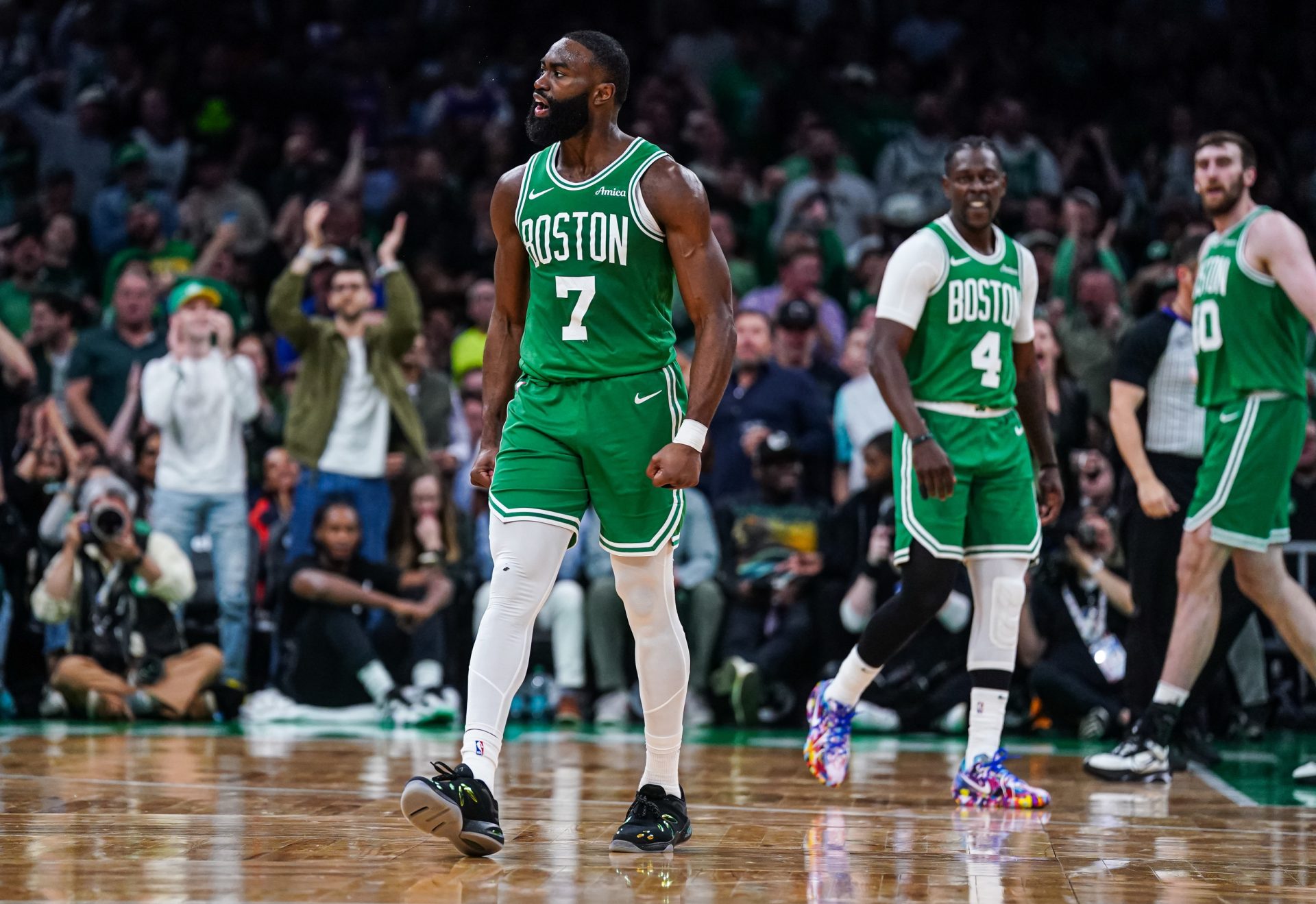 May 7, 2025; Boston, Massachusetts, USA; Boston Celtics guard Jaylen Brown (7) react after a play against the New York Knicks in the second quarter during game two of the second round for the 2025 NBA Playoffs at TD Garden.