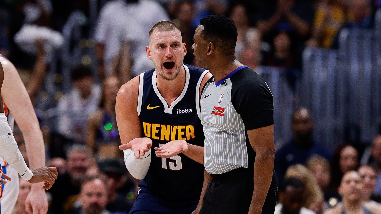 May 11, 2025; Denver, Colorado, USA; Denver Nuggets center Nikola Jokic (15) reacts towards referee Sean Wright (4) after a play in the second quarter against the Oklahoma City Thunder during game four of the second round of the 2025 NBA Playoffs at Ball Arena.