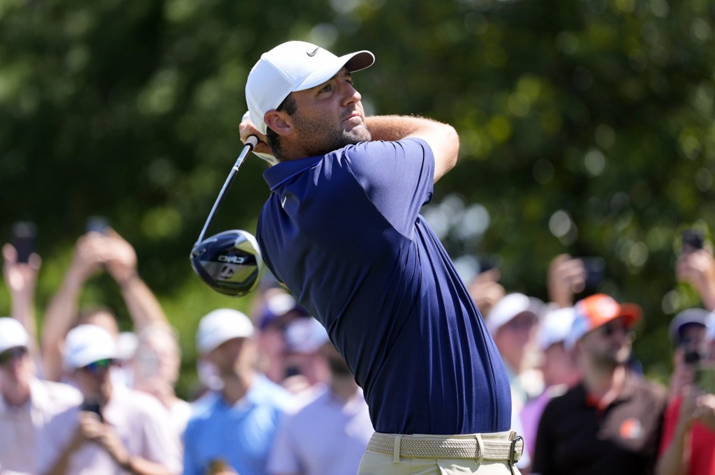 May 18, 2025; Charlotte, North Carolina, USA; Scottie Scheffler tees off on the third hole during the final round of the PGA Championship golf tournament at Quail Hollow.