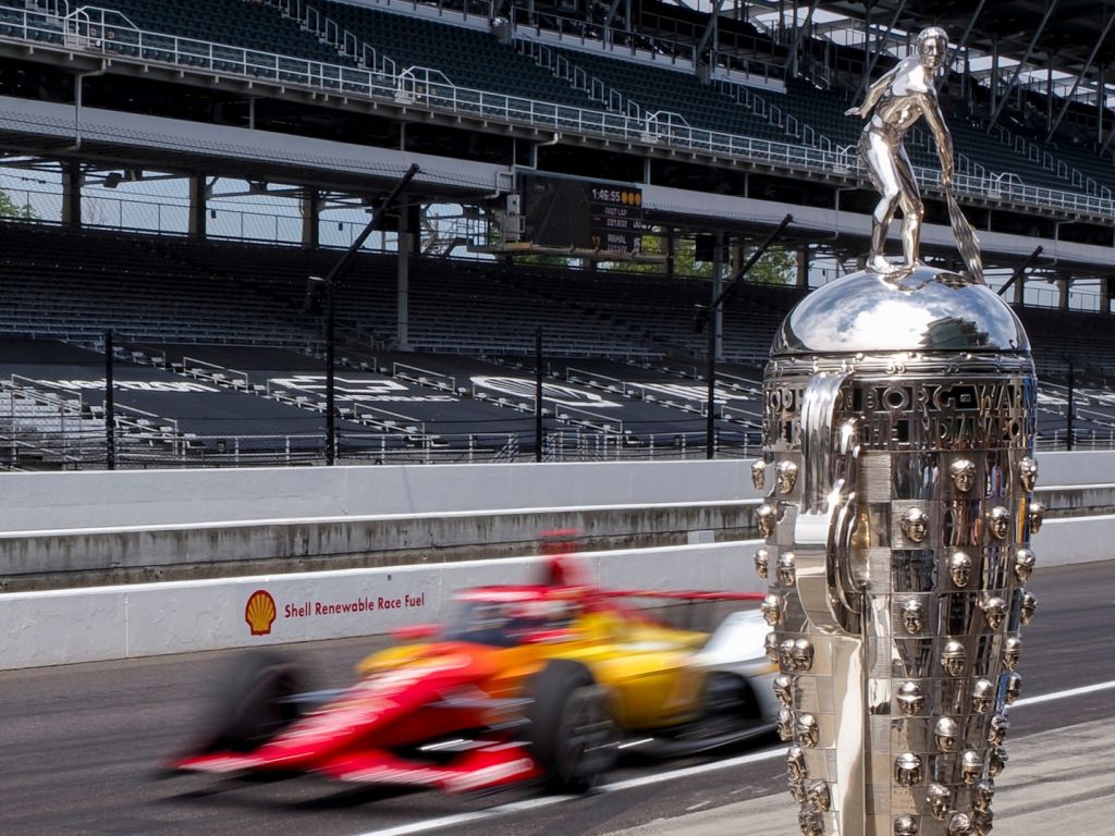 Team Penske driver Josef Newgarden (2) pulls into pit lane Monday, May 19, 2025, during a practice for the 109th running of the Indianapolis 500 at Indianapolis Motor Speedway.